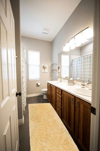 Latepis Faux Sheepskin Fur Furry Pale Yellow 2 ft. x 8 ft. Shaggy Fluffy Area Rug ... in Wooden and Grey Bathroom