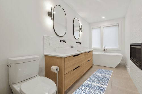 Moroccan Hype Boho Vintage Tribal Cream/Blue 2 ft. x 8 ft. Runner Rug in Scandinavian Neutral bathroom
