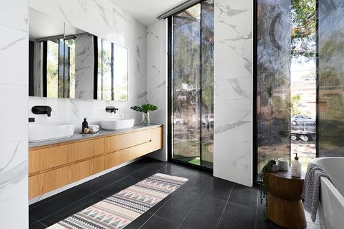 Poowe Cotton Woven Tassles Area Rug in Modern Black Tiled bathroom