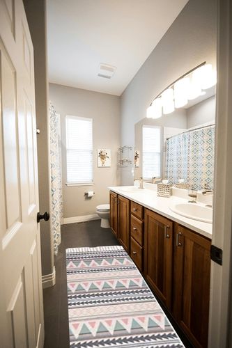 Poowe Cotton Woven Tassles Area Rug in Wooden and Grey Bathroom