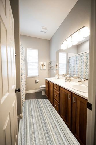 Garland Rug Carnival Stripe 3 ft. x 8 ft. Random Earth Tone Runner Rug in Wooden and Grey Bathroom