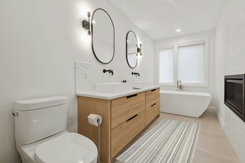 Garland Rug Carnival Stripe 3 ft. x 8 ft. Random Earth Tone Runner Rug in Scandinavian Neutral bathroom