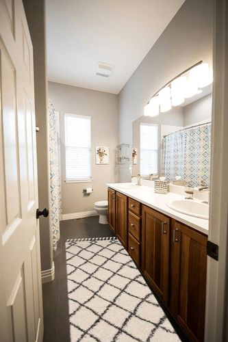 Purtell Abstract Cream/Charcoal Area Rug Foundstone Rug Size: Runner 2'3" x 7' in Wooden and Grey Bathroom
