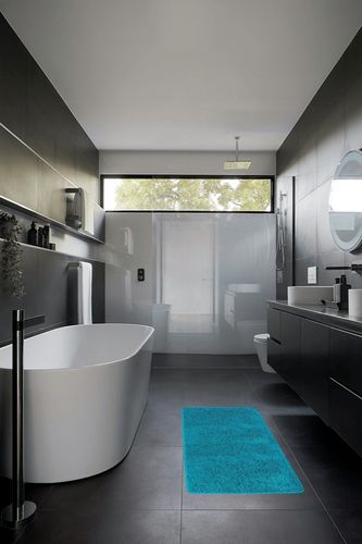 mDesign Non-Slip Microfiber Polyester Rectangular Spa Mat/Bath Rug, Plush Water Absorbent Accent Rug for Bathroom Vanity, Bathtub/Shower, Machine Washable, 60" x 21", Heathered Deep Teal Blue in Black Modern Bathroom