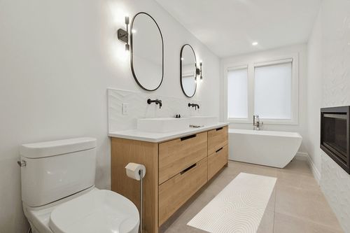 Ayjah Cream Modern Geometric Area Rug Wade Logan Rug Size: Runner 2'2" x 7' in Scandinavian Neutral bathroom