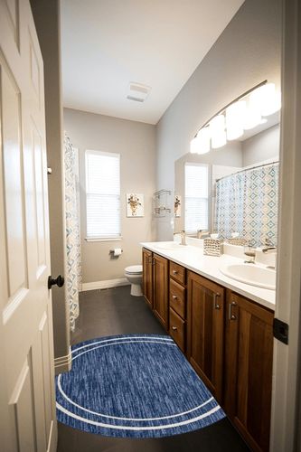 Nourison Essentials Indoor/Outdoor Solid Bordered Navy/Ivory 4' x Round Area Rug, Easy Cleaning, Non Shedding, Bed Room, Living Room, Dining Room, Backyard, Deck, Patio (4 Round) in Wooden and Grey Bathroom