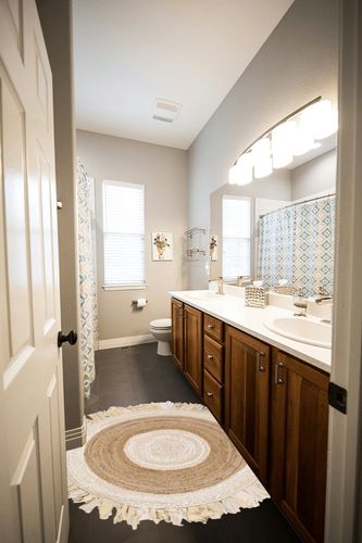 Highland Dunes Jaziel Handwoven Beige/Natural Area Rug, Size: Round 4' in Wooden and Grey Bathroom