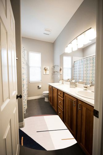 Delahni Handmade Tufted Wool Ivory Area Rug Latitude Run Rug Size: Round 4' in Wooden and Grey Bathroom