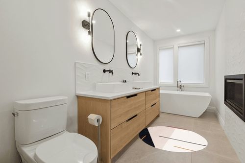Delahni Handmade Tufted Wool Ivory Area Rug Latitude Run Rug Size: Round 4' in Scandinavian Neutral bathroom