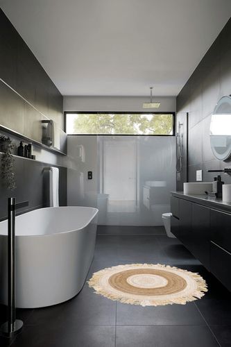 Highland Dunes Jaziel Handwoven Beige/Natural Area Rug, Size: Round 4' in Black Modern Bathroom