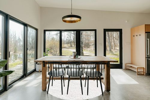 White 6 Ft Round Shag Rug in Scandinavian Dining Room with Rectangular Table