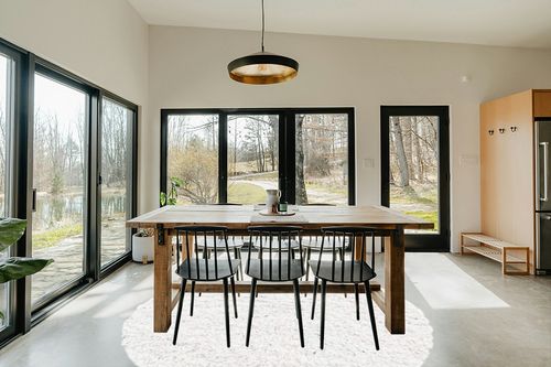 White 8 Ft Round Shag Rug in Scandinavian Dining Room with Rectangular Table