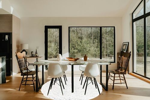 White 6 Ft Round Shag Rug in Modern Scandinavian Dining Room with Black Accents