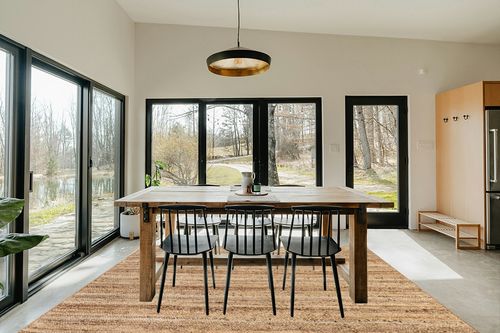 nuLOOM Rigo Hand Woven Farmhouse Jute Area Rug, 8' x 10', Natural in Scandinavian Dining Room with Rectangular Table