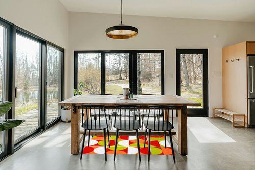 Mid Century Modern Abstract Orange Green Red Wool Area Rug 3x5 Vibrant Art Decor Minimalist Rug for Livingroom Bedroom Diningroom Boho Chic Floor Carpet in Scandinavian Dining Room with Rectangular Table