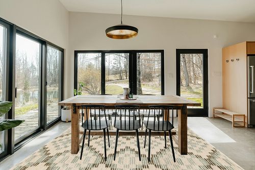 Dash & Albert Diamond Cove Hand Tufted Wool Rug, 8 X 10 Feet, Green/Sky Blue Geometric Pattern in Scandinavian Dining Room with Rectangular Table