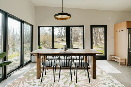 Safavieh Courtyard Collection Area Rug - 6'7" x 9'6", Ivory & Green, Non-Shedding & Easy Care, Indoor/Outdoor & Washable-Ideal for Patio, Backyard, Mudroom (CY9433-52745) in Scandinavian Dining Room with Rectangular Table