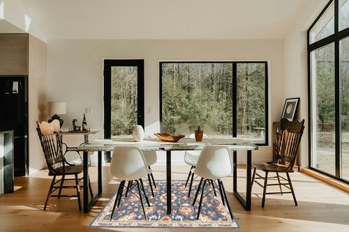 Safavieh Aspen Collection Area Rug - 5' Round, Blue & Rust, Handmade Boho Wool, Ideal for High Traffic Areas in Living Room, Bedroom (APN146M) in Modern Scandinavian Dining Room with Black Accents