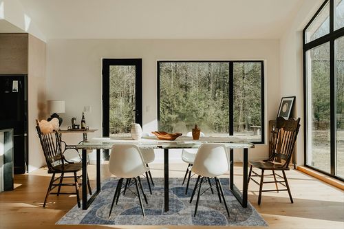 Washable Rug 5x7 Area Rugs for Bedroom, Soft Low Pile Living Room Rugs with Non-Slip Backing, Vintage Patchwork Indoor Floor Carpet for Dining Room Nursery Home Office-Blue/Grey in Modern Scandinavian Dining Room with Black Accents