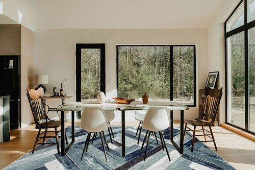 LUXE WEAVERS Modern Abstract Wood Carpet Geometric Blue 8x10 Area Rug in Modern Scandinavian Dining Room with Black Accents