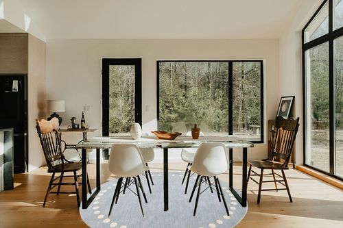 SAFAVIEH Kids Collection Area Rug - 7' Round, Blue & Ivory, Handmade Wool, Polka Dot Border Design, Ideal for The Living Room, Bedroom, Dining Room, Kids Room, Nursery (SFK802M-7R) in Modern Scandinavian Dining Room with Black Accents