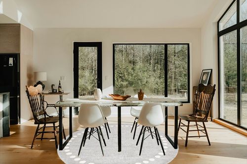 SAFAVIEH Kids Collection Area Rug - 7' Round, Grey, Handmade Wool, Polka Dot Border Design, Ideal for The Living Room, Bedroom, Dining Room, Kids Room, Nursery (SFK802F-7R) in Modern Scandinavian Dining Room with Black Accents