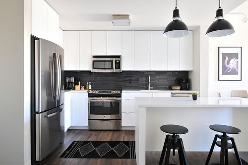 MitoVilla Black Boho Bathroom Rug 2'x4.3', Black White Runner Rug for Bedroom, Farmhouse Tribal Bath Mat with Tassel, Vintage Geometric Kitchen Rugs, Washable Cotton Woven Living Room Throw Rugs in White and Black Modern Kitchen