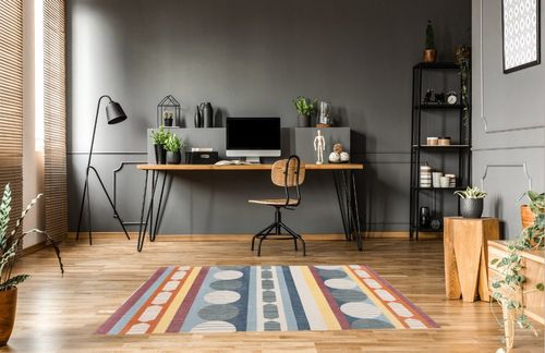 SAFAVIEH Orwell Collection Area Rug - 5'3" x 7'7", Blue & Yellow, Mid-Century Modern Design, Non-Shedding & Easy Care, Ideal for High Traffic Areas in Living Room, Bedroom (ORW367M) in Grey Home office with Wooden Floor