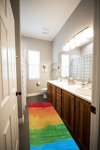 Couristan Rainbow Passion Area Rug, Multicolor, 2' x 8' Runner in Wooden and Grey Bathroom
