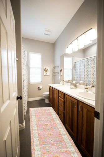 Momeni Anatolia Area Rug, 2 ft 3 in x 7 ft 6 in, Pink in Wooden and Grey Bathroom