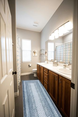 GAOMON Modern Area Rug 2x8 Boho Braided Print Rug Ultra Soft Hallway Runners Entryway Rug Runner Farmhouse Kitchen Mat Non-Shedding Fluffy Floor Decor Non-Slip Bedroom Laundry Distressed Rug Blue in Wooden and Grey Bathroom