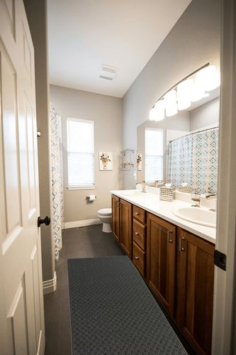 Cinder Gray Town Square Living Room Runner in Wooden and Grey Bathroom