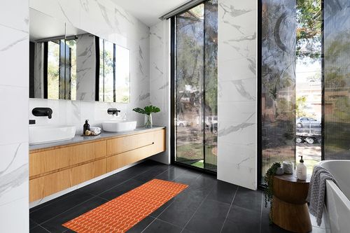 Momeni Rugs , Baja Collection Contemporary Indoor & Outdoor Area Rug, Easy to Clean, UV protected & Fade Resistant, 2'3" x 4'6", Orange in Modern Black Tiled bathroom