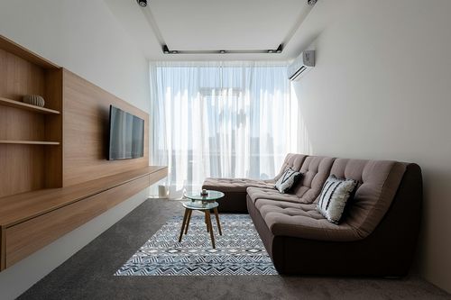 Atkisson Geometric Machine Washable Performance Light Aqua/Blue Rug Ivy Bronx Rug ... in Grey Living Room with Brown Couch
