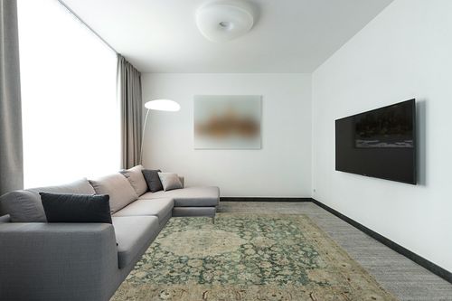 Magnolia Home by Joanna Gaines x Loloi Sinclair Collection SIN-05 Jade / Sand 7'-6" x 9'-6" Area Rug in Modern Living Room with Grey Couch