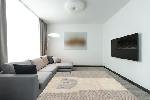 Valetta Abstract Beige Area Rug Isabelle & Max Rug Size: Rectangle 7'10" x 10'10" in Modern Living Room with Grey Couch