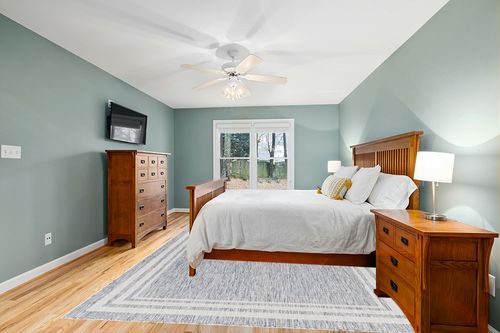 Mark&Day Outdoor Rugs, 9x12 Agency Cottage Denim Indoor/Outdoor Area Rug, Blue Ivory Carpet for Patio, Porch, Deck, Bedroom, Living Room or Kitchen (9'2" x 12') in Teal and Orange Wood Bedroom