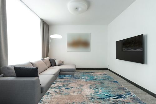 SAFAVIEH Madison Collection Area Rug - 9' x 12', Blue & Grey, Modern Boho Abstract Design, Non-Shedding & Easy Care, Ideal for High Traffic Areas in Living Room, Bedroom (MAD440M) in Modern Living Room with Grey Couch