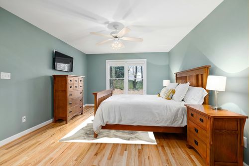 rodeo Exotic Brazilian Grey Brindle Cowhide Rug in Teal and Orange Wood Bedroom