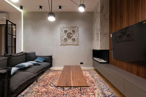 Loloi Layla 7'-6" x 9'-6" Area Rug in Red/Navy - Thick Area Rug, Soft Area Rug with, Vintage Inspired Distressed Design, Low Pile, Non-Shedding, Easy Clean, Durable Living Room Rug in Dark Wood Living Room with Black Couch