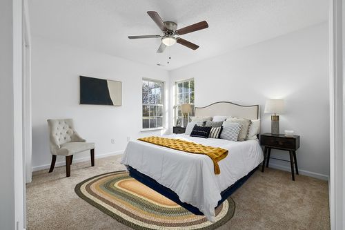 SAFAVIEH Braided Collection Area Rug - 5' x 8' Oval, Multi, Handmade Country Cottage Reversible, Ideal for High Traffic Areas in Living Room, Bedroom (BRD308A) in White and Yellow Modern Bedroom