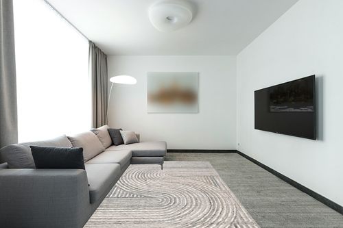 SAFAVIEH South Hampton Collection 6' x 9' Beige SHA301B Handmade Abstract Wool Area Rug in Modern Living Room with Grey Couch