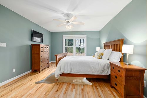 Genuine Palomino Beige and White Cowhide Rug 6 x 7-8 ft. 180 x 240 cm in Teal and Orange Wood Bedroom