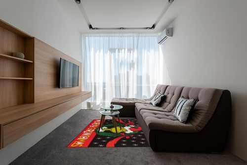 Gertmenian Kids Playroom & Game Room Carpet, The Grinch Childrens Rug, Kids Novelty Home Decor, Ideal Area Rug for Child Bedroom 54x78, Merry Grinchmas Wreath, 28601 in Grey Living Room with Brown Couch