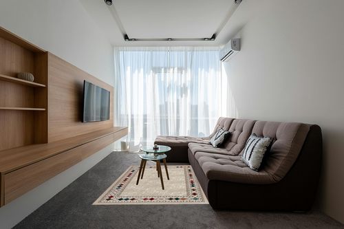 Antep Rugs Alfombras Modern Bordered 5x7 Non-Skid (Non-Slip) Low Profile Pile Rubber Backing Indoor Area Rugs (Beige, 5' x 7') in Grey Living Room with Brown Couch