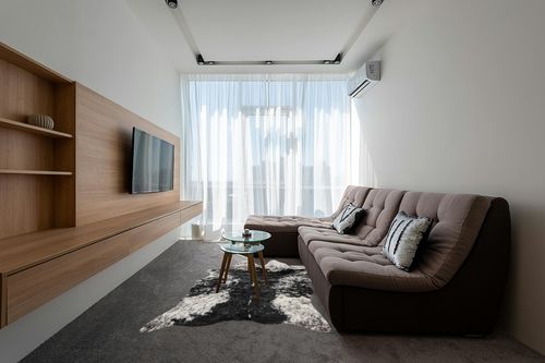 Luxe Faux Cowhide Rug for Rustic and Western Decor | Low Pile Faux Fur Rug with Salt/Pepper Black + White Cow Print | Cruelty-Free Fade Resistant Living Room Rugs | 5-1/4 x 7-1/2 ft in Grey Living Room with Brown Couch