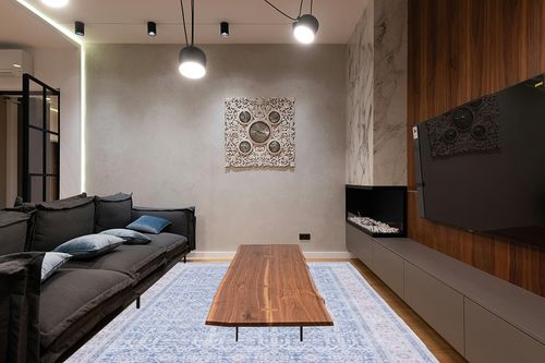 SAFAVIEH Tucson Collection Area Rug - 8' x 10', Blue & Rust, Persian Design, Non-Shedding Machine Washable & Slip Resistant Ideal for High Traffic Areas in Living Room, Bedroom (TSN186M) in Dark Wood Living Room with Black Couch