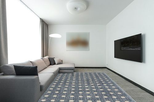 LUXE WEAVERS Modern Geometric Dots Blue 8x10 Area Rug in Modern Living Room with Grey Couch