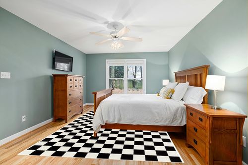 Luxe Weavers Modern Checkered Area Rug Black 8x10 Stain Resistant Carpet for Living Room in Teal and Orange Wood Bedroom