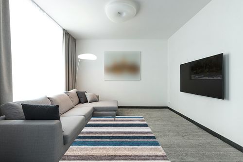 NuLOOM Drey Striped Shag Area Rug, 5' x 8', Blue Multi in Modern Living Room with Grey Couch